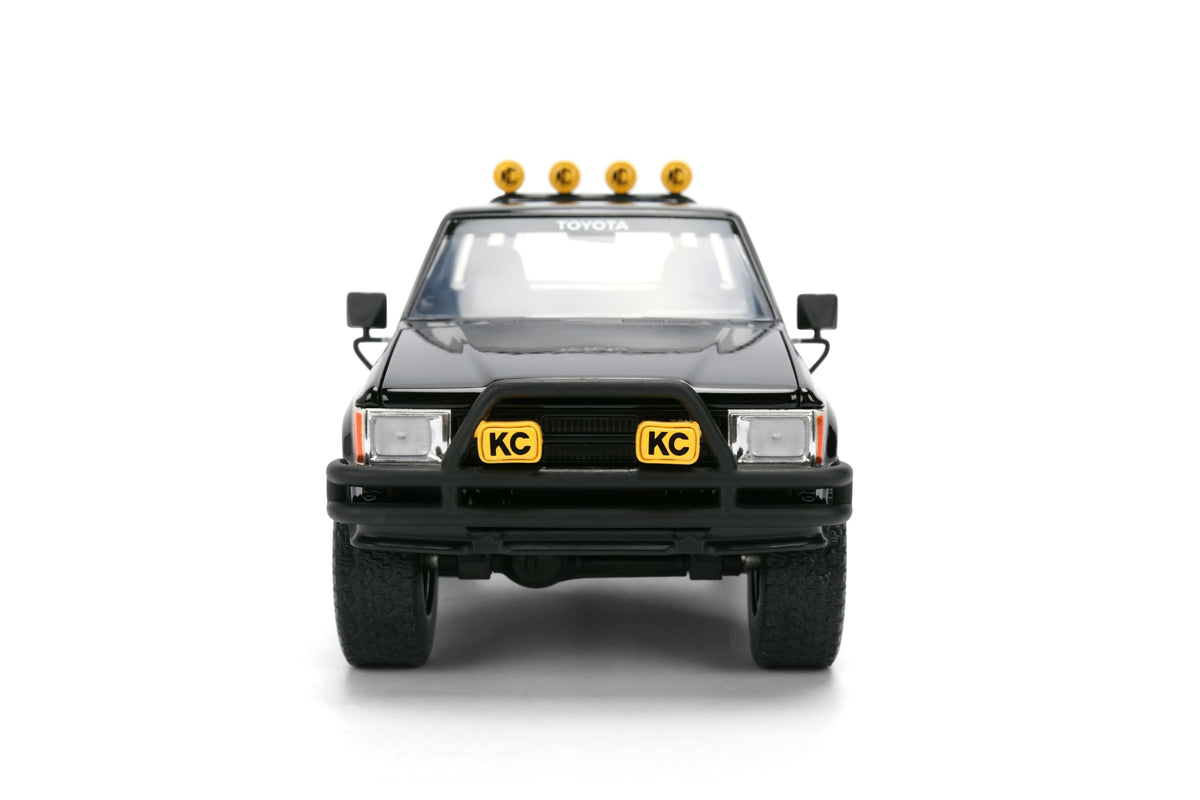 Back to the Future 1985 Toyota SR5 Pickup Truck with Skateboard - 1:24 Hollywood Rides Diecast Model with Opening Doors and Hood - Black - for Collectors and Enthusiasts 8+