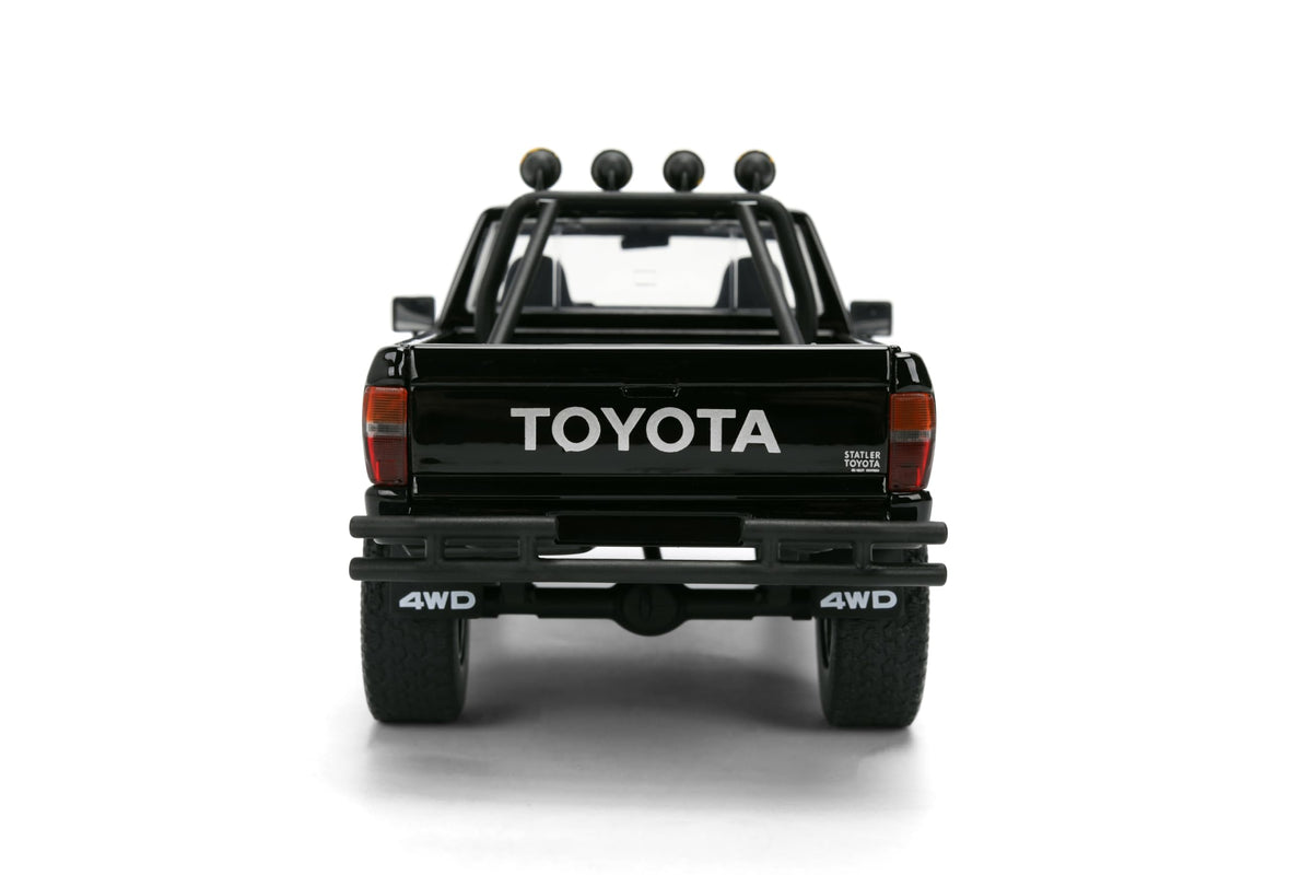 Back to the Future 1985 Toyota SR5 Pickup Truck with Skateboard - 1:24 Hollywood Rides Diecast Model with Opening Doors and Hood - Black - for Collectors and Enthusiasts 8+