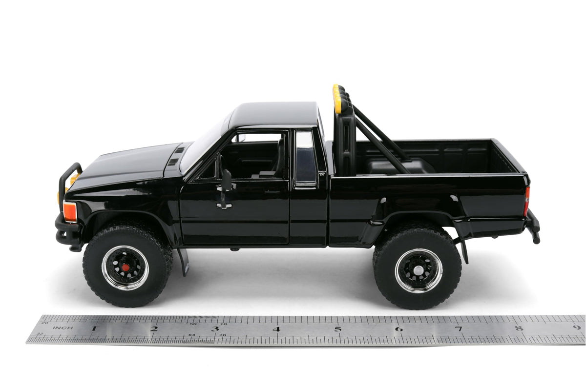 Back to the Future 1985 Toyota SR5 Pickup Truck with Skateboard - 1:24 Hollywood Rides Diecast Model with Opening Doors and Hood - Black - for Collectors and Enthusiasts 8+