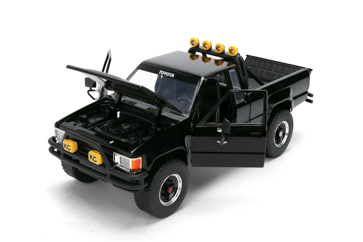 Back to the Future 1985 Toyota SR5 Pickup Truck with Skateboard - 1:24 Hollywood Rides Diecast Model with Opening Doors and Hood - Black - for Collectors and Enthusiasts 8+