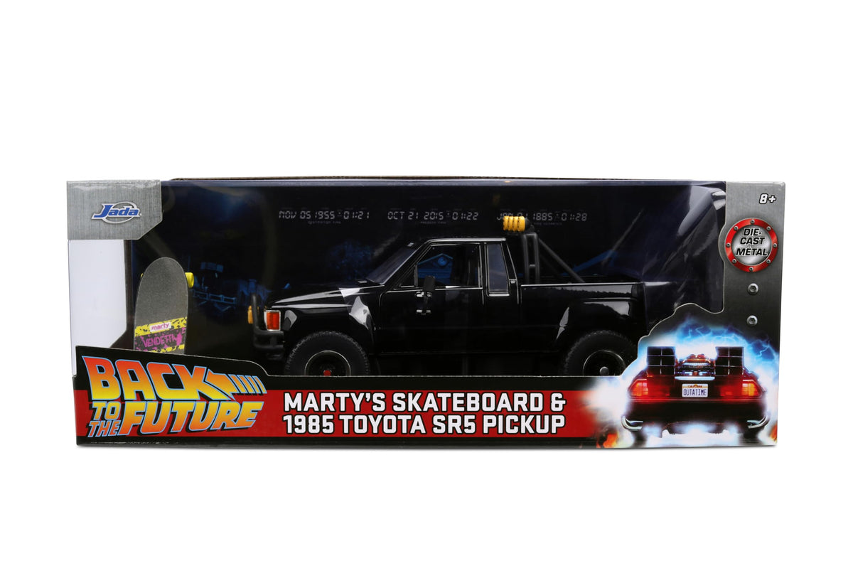 Back to the Future 1985 Toyota SR5 Pickup Truck with Skateboard - 1:24 Hollywood Rides Diecast Model with Opening Doors and Hood - Black - for Collectors and Enthusiasts 8+