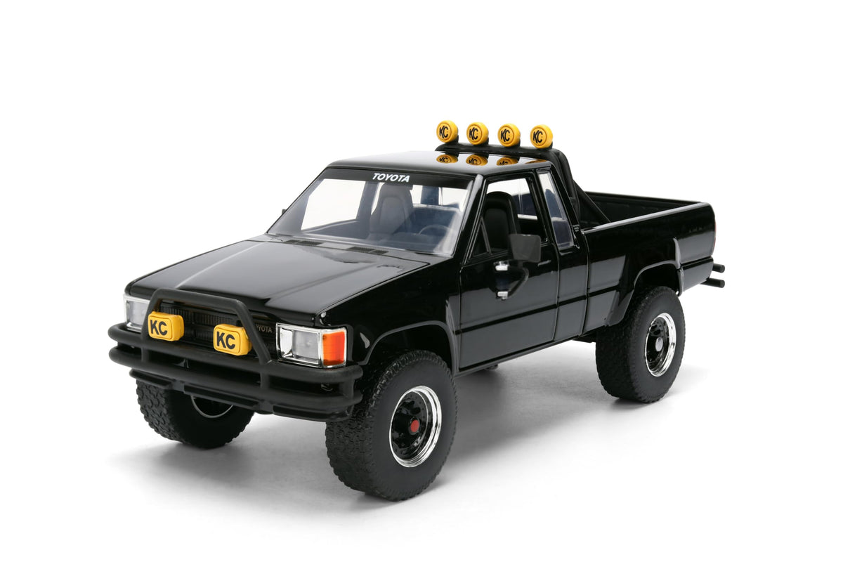 Back to the Future 1985 Toyota SR5 Pickup Truck with Skateboard - 1:24 Hollywood Rides Diecast Model with Opening Doors and Hood - Black - for Collectors and Enthusiasts 8+