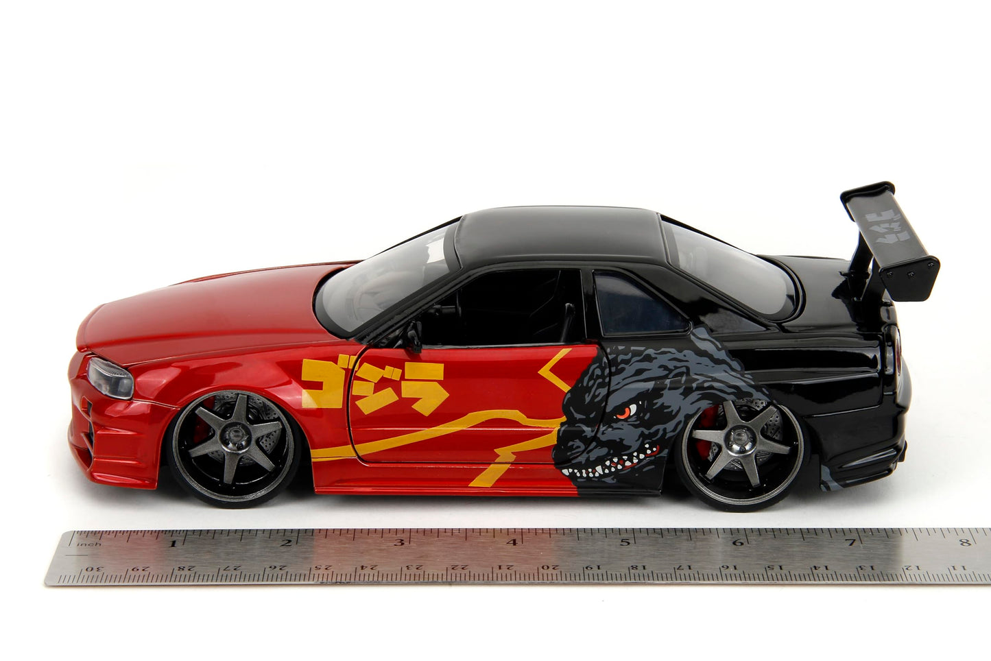 Jada Godzilla 2003 Nissan Skyline GTR R34 – 1:24 Scale Die-Cast, Opening Doors, Hood, Trunk, Rubber Tires – Collectible for Adults – Toho Licensed